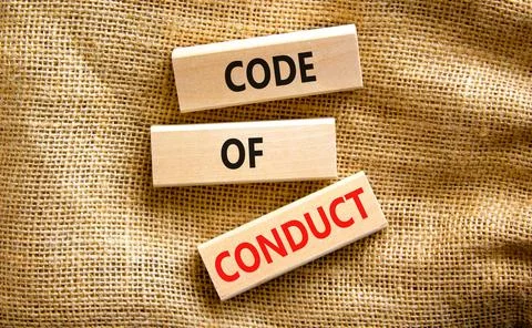 Code of conduct symbol. Concept words Code of conduct on wooden blocks on a b 스톡 사진