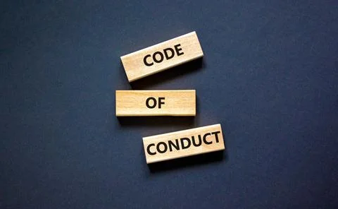 Code of conduct symbol. Concept words Code of conduct on wooden blocks on a b 写真素材