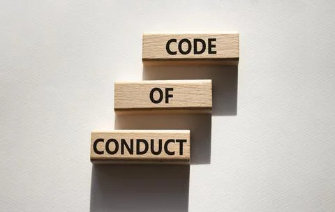 Code of conduct symbol. Wooden blocks with words Code of conduct. Beautiful.. 库存照片