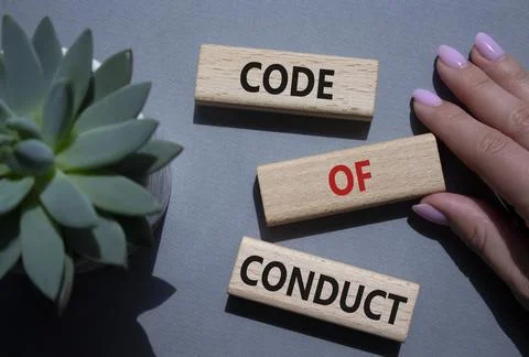 Code of conduct symbol. Wooden blocks with words Code of conduct. Beautiful.. 스톡 사진