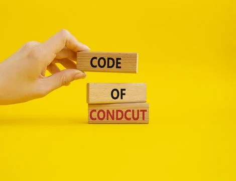 Code of conduct symbol. Wooden blocks with words Code of conduct. Beautiful.. Fotos de archivo