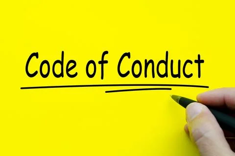 Code of Conduct text on yellow notepad. Business culture concept Stock Photos