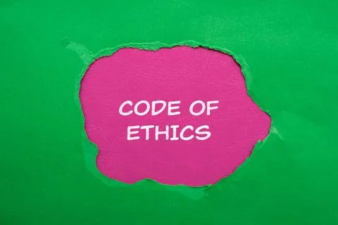 Code of ethics lettering on ripped green paper with pink background Foto stock