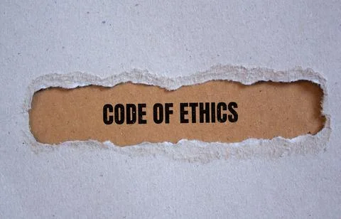 Code of ethics lettering on ripped paper 写真素材