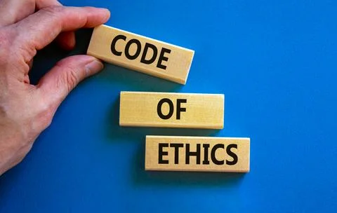 Code of ethics symbol. Concept words 'Code of ethics' on wooden blocks on a b Foto stock