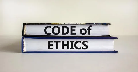Code of ethics symbol. Concept words 'Code of ethics' on books on a beautiful Stock Photos