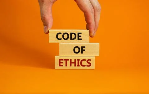 Code of ethics symbol. Concept words 'Code of ethics' on wooden blocks on a b Stock-Fotos