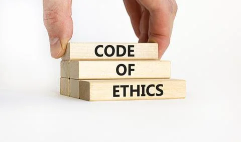 Code of ethics symbol. Concept words 'Code of ethics' on wooden blocks on a b Stock-Fotos