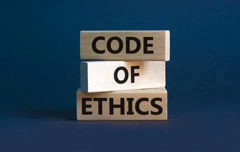 Code of ethics symbol. Concept words 'Code of ethics' on wooden blocks on a b Stock-Fotos