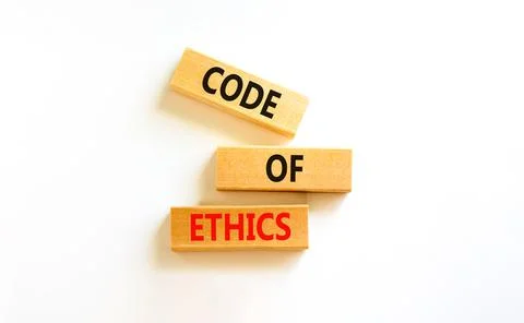 Code of ethics symbol. Concept words Code of ethics on wooden blocks on a bea Foto stock