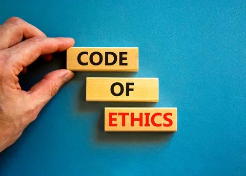 Code of ethics symbol. Concept words Code of ethics on wooden blocks on a bea Foto stock