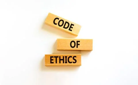 Code of ethics symbol. Concept words Code of ethics on wooden blocks on a bea Foto stock