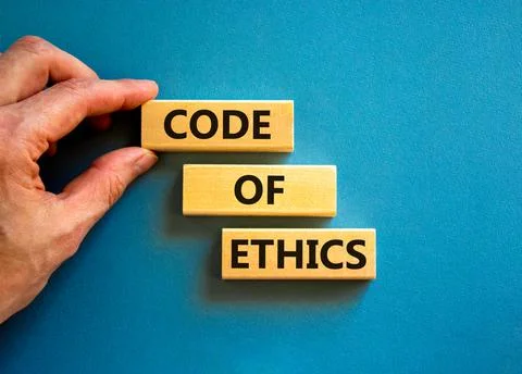 Code of ethics symbol. Concept words Code of ethics on wooden blocks on a bea 写真素材