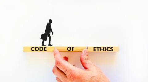 Code of ethics symbol. Concept words Code of ethics on wooden blocks on a bea Foto stock