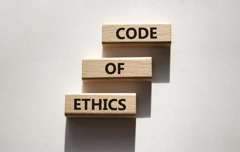 Code of ethics symbol. Concept words Code of ethics on wooden blocks. Beaut.. Stock Photos