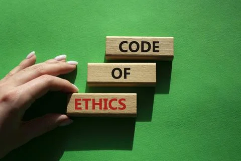 Code of ethics symbol. Concept words Code of ethics on wooden blocks. Beaut.. Fotos de archivo