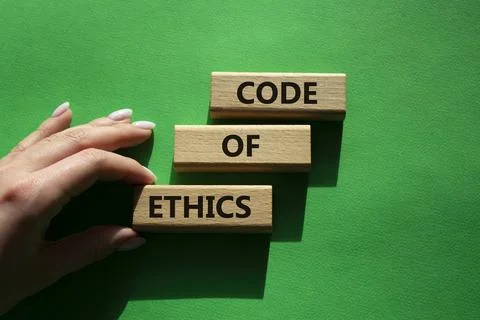 Code of ethics symbol. Concept words Code of ethics on wooden blocks. Beaut.. 写真素材