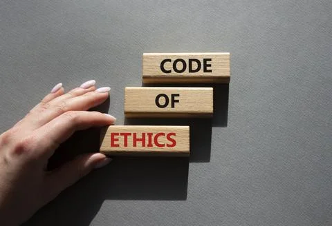 Code of ethics symbol. Concept words Code of ethics on wooden blocks. Beaut.. Stock Photos