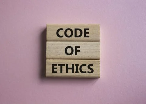 Code of ethics symbol. Concept words Code of ethics on wooden blocks. Beaut.. Stock Photos