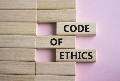 Code of ethics symbol. Concept words Code of ethics on wooden blocks. Beaut.. Stock Photos