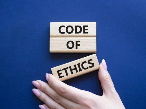 Code of ethics symbol. Concept words Code of ethics on wooden blocks. Beaut.. Stock Photos