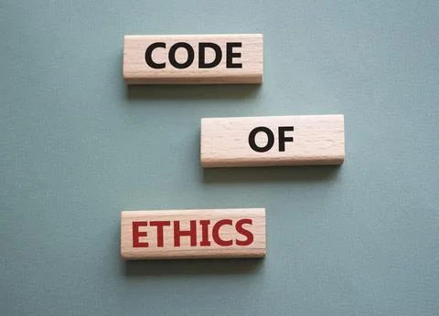 Code of ethics symbol. Concept words Code of ethics on wooden blocks. Beaut.. Stock Photos