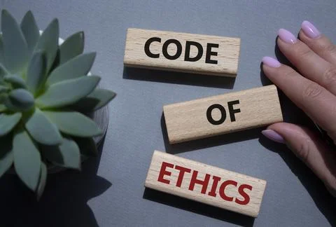 Code of ethics symbol. Concept words Code of ethics on wooden blocks. Beaut.. Stock-Fotos
