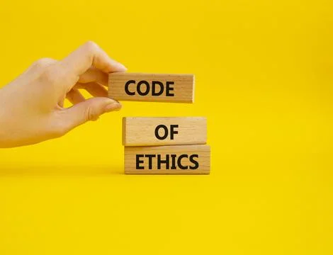 Code of ethics symbol. Concept words Code of ethics on wooden blocks. Beaut.. Foto stock