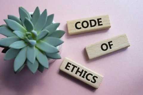 Code of ethics symbol. Concept words Code of ethics on wooden blocks. Beaut.. 写真素材