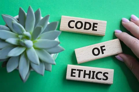 Code of ethics symbol. Concept words Code of ethics on wooden blocks. Beaut.. Stock-Fotos