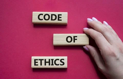 Code of ethics symbol. Concept words Code of ethics on wooden blocks. Beaut.. Stock Photos