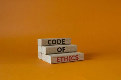 Code of ethics symbol. Concept words Code of ethics on wooden blocks. Beaut.. Stock Photos