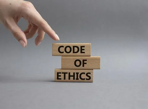 Code of ethics symbol. Concept words Code of ethics on wooden blocks. Beaut.. 写真素材