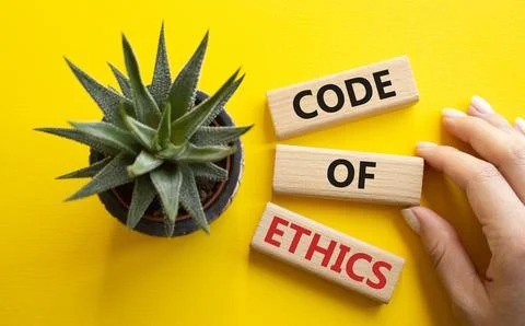 Code of ethics symbol. Concept words Code of ethics on wooden blocks. Busin.. Foto stock