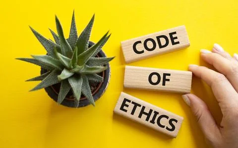 Code of ethics symbol. Concept words Code of ethics on wooden blocks. Busin.. Stock-Fotos