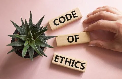 Code of ethics symbol. Concept words Code of ethics on wooden blocks. Busin.. Stock Photos