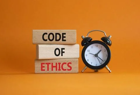 Code of ethics symbol. Concept words Code of ethics on wooden blocks with a.. Stock Photos