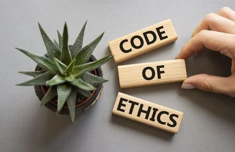 Code of ethics symbol. Concept words Code of ethics on wooden blocks. Busin.. 写真素材