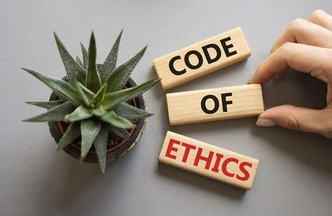 Code of ethics symbol. Concept words Code of ethics on wooden blocks. Busin.. 写真素材