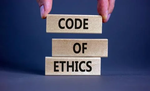 Code of ethics symbol. Wooden blocks with words 'Code of ethics'. Beautiful g Stock-Fotos