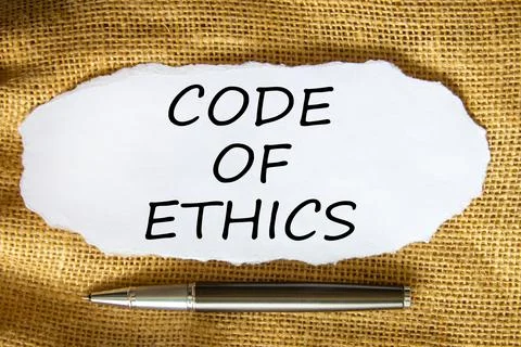 Code of ethics symbol. Words 'Code of ethics' on white paper. Black metallic  写真素材