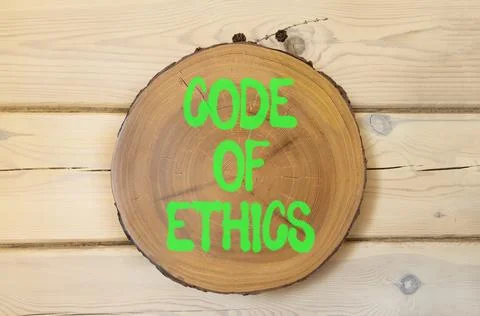 Code of ethics words symbol. Concept words Code of ethics on beautiful wood.. Stock Photos