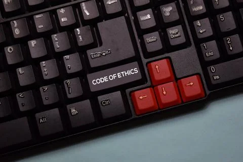 Code of Ethics write on keyboard isolated on laptop background Stock Photos