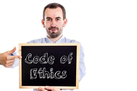 Code of Ethics - Young businessman with blackboard 写真素材