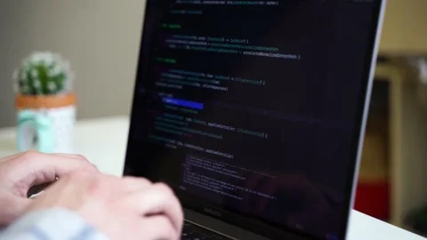 Code on laptop screen, worki in office Stock Footage 149138283