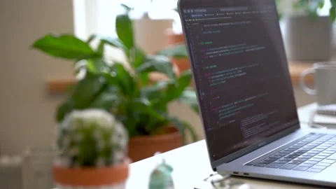 Code on laptop screen, worki in office Stock Footage 149138290
