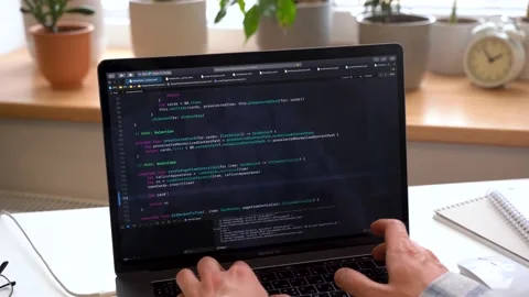 Code on laptop screen, worki in office Stock Footage 149138302