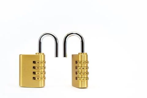 Code lock. Close-up of a combination lock with chrome numbers on a white Stock Photos