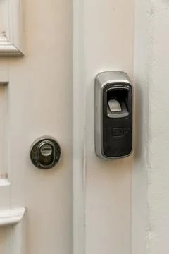A code lock on a door with a door knob Stock Photos
