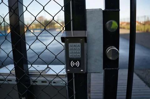 Code lock on a gate. Stock Photos